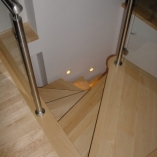 Spindeltreppe mit Formblechkonsole als Geschäftstreppe