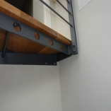 Spindeltreppe in Kragarmoptik als Geschäftstreppe